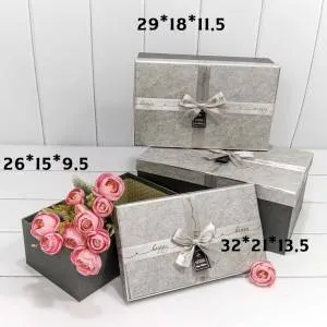Коробка 26*15*9,5 см "Happy" с бантом серебро